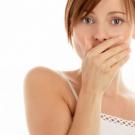 От чего кислый привкус во рту при беременности?